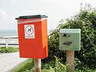 Dog waste bags and bin in Middle Beach car park � Studland United Nudists
